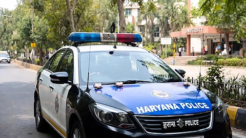 An image of a Haryana Police car.