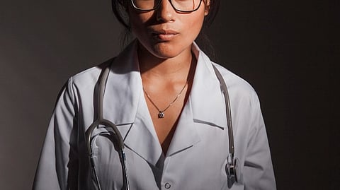 Doctor with dark background