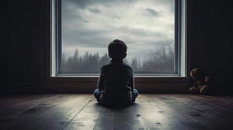 Image of a child suffering from depression.