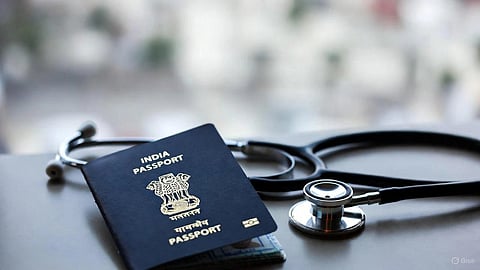 An image of an Indian passport and stethoscope on table.