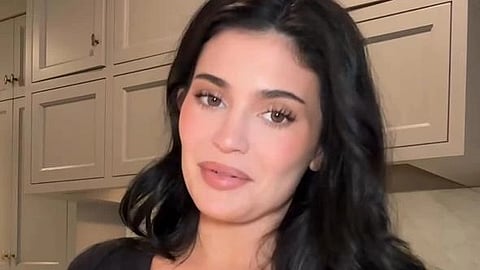 An image of Kylie Jenner in a black dress.