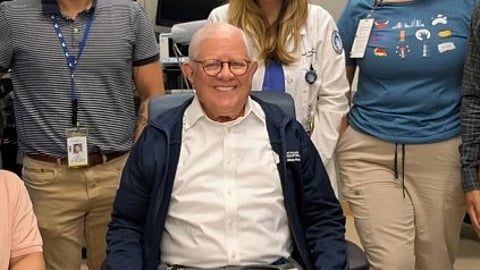 An image of Dr. Stephen Sheldon among a group of other doctors.