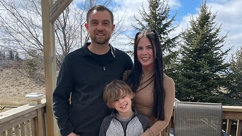 A family pic of three showing Stephanie Schmitz, her son and boyfriend Lee Anderson.