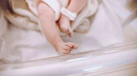 A baby's legs in hospital.