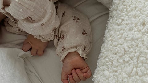 A baby's hands.