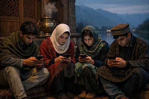 Kashmiri teenagers sitting together but focused on their smartphones instead of interacting, illustrating digital isolation among students.