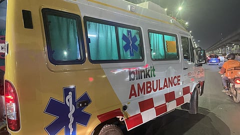 a Blinkit ambulance on the road