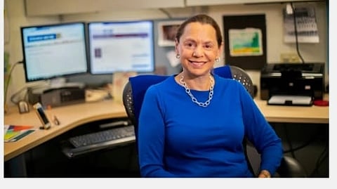 A lady in blue dress.