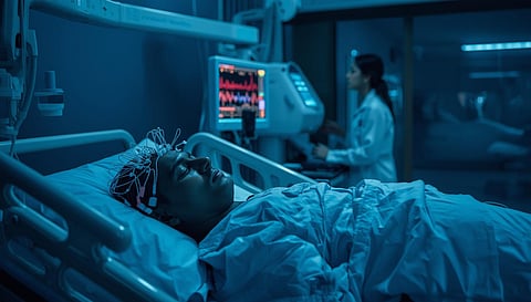 A modern Indian sleep laboratory at night, a patient sleeping on a bed connected to polysomnography sensors, soft blue ambient lighting