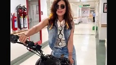 Dr. Swapna mishra on a bike.