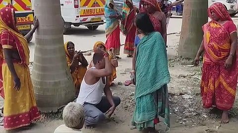 woman undergoing ritual after snakebite