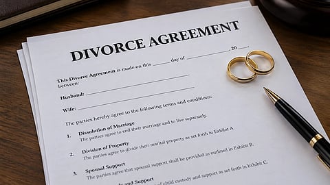 Divorce agreement with ring and pen