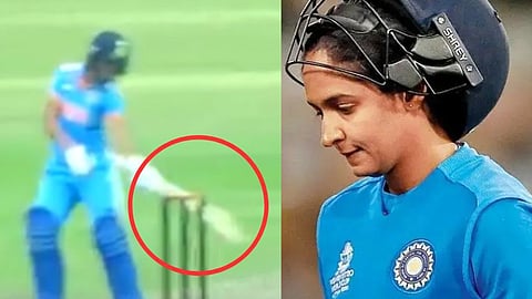 അംപയറുടെ തെറ്റായ തീരുമാനത്തിൽ ഔട്ടായ ഹർമൻപ്രീത് കൗർ സ്റ്റമ്പ് അടിച്ചുതെറിപ്പിക്കുന്നു (ഇടത്ത്).