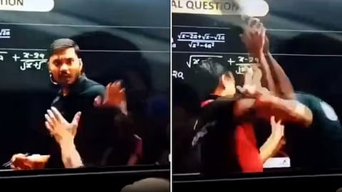 student attacking teacher with slipper - Video Screenshot