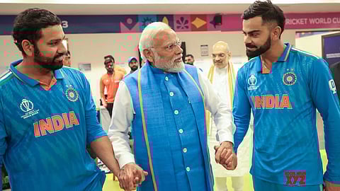 Prime Minister Narendra Modi with Rohit Sharma and Virat Kohli in the dressing room after India lost to Australia the world cup final against Australia in Ahmedabad on November 19, 2023.