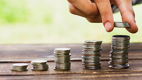 Stack of coins, representative image for welfare pension