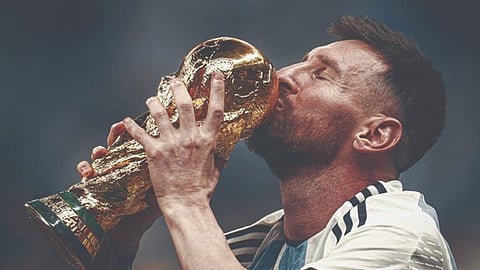 Lionel Messi with world cup trophy