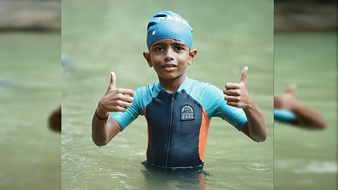 7 year old boy about to conquer Vembanad backwaters