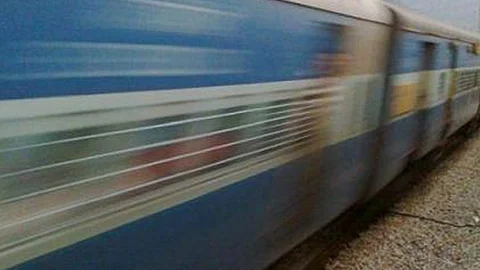 man arrested for pushing woman on train tracks