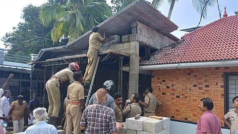 accident occurred while demolishing the roof workers stuck