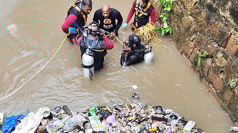 Fire and rescue service and scuba divers searching Amazyizhanjan Thodu