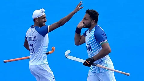 India captain Harmanpreet Singh celebrates after scoring his second goal