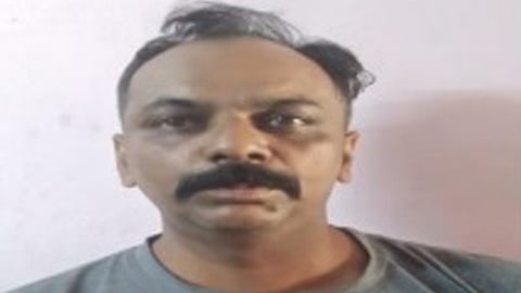 man was arrested for extorting money by offering him a job abroad