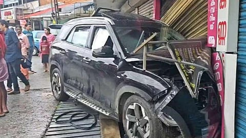 car rams in to shop