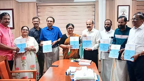 Kerala University officials handover Slip K App model to Minister Dr R Bindu