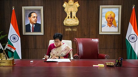 atishi takes charge delhi cm