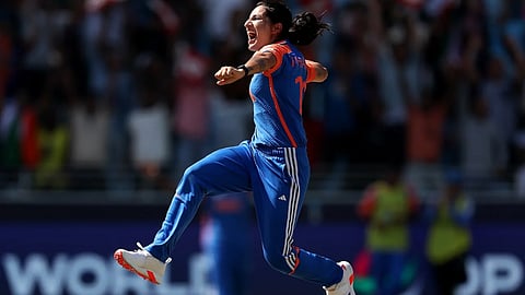 Renuka Singh celebrates after clean bowling Pakistan opener Gull Feroza