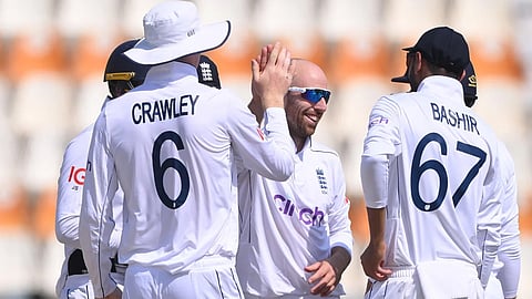 England players celebrates with Jack Leach