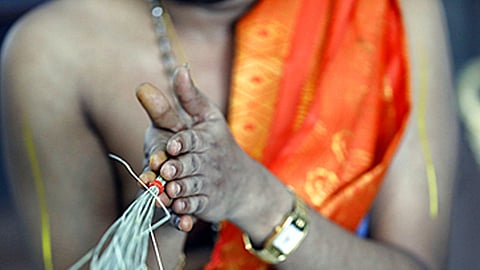 priest went to a house to exorcise a ghost; he drowned with 11.5 pounds of gold jewellery
