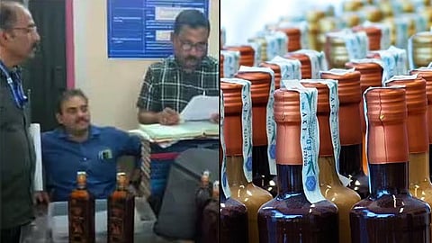 liquor as bribe Case against excise officials kochi