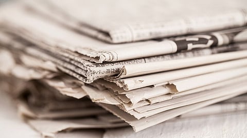 Traders to sue university over ad depicting imaginary note ban