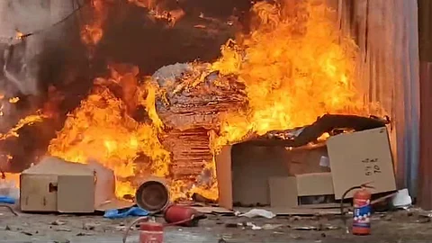 Fire breaks out at car service center in Kalamassery