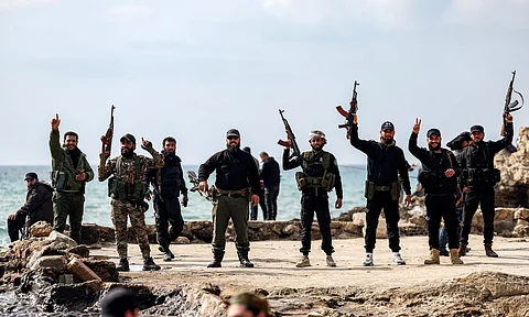 Al-Qaeda jihadist group HTS celebrates after killing nearly 1,000 Christians in the past two days on the Mediterranean coast of Syria's western city of Latakia