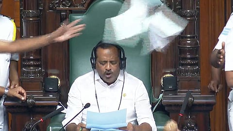 bjp mlas seek probe in honey trap charge protest in karnataka assembly 18 suspended for 6 months