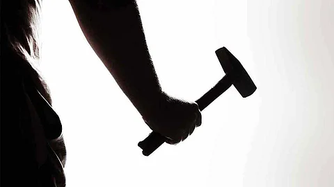 Young man with a hammer; then threats and obscenities
