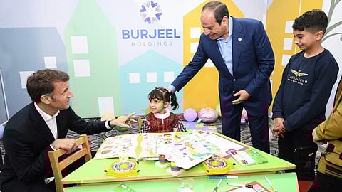French -Egypt presidents visit play ground for gaza kids