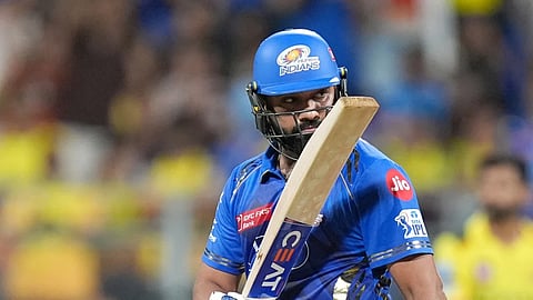 Mumbai Indians opener Rohit Sharma greets fans after completing his half century against Chennai Super Kings