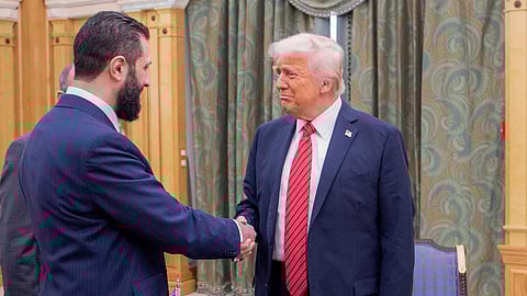 Donald Trump shakes hands with Syria's interim president Ahmed al-Sharaa in Riyadh.