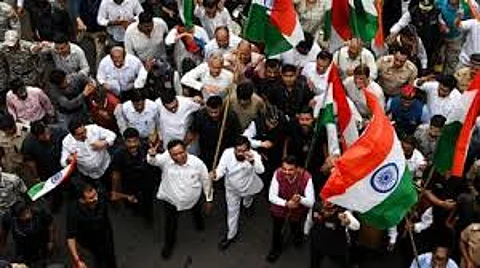 Congress follows BJP with tricolor march