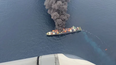 cargo ship fire sea water being inspected in kannur
