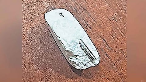 metal fragment inside tablet child rights commission case registered