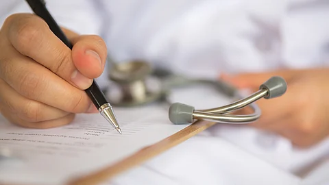 doctors illegible handwriting faces action kerala