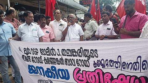 Protest against Tomin Thachankary