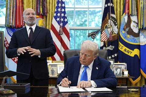 Commerce Secretary Howard Lutnick speaks as President Donald Trump signs the Gold Card executive order on September 19