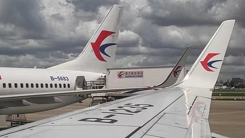 China Eastern Airlines Boeing 737-800 aircraft are parked at Shanghai Hongqiao International Airport in Shanghai on July 22, 2025.