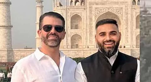 Guide Nitin Singh and Jr. Trump in front of the Taj Mahal